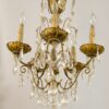 A Jansen chandelier of gilt bronze and crystal.
